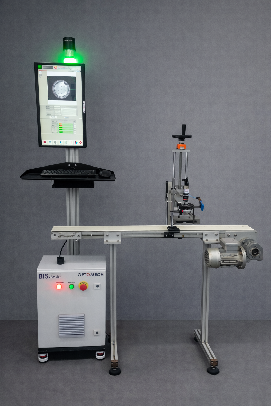 Single-camera view inside Optomech BIS inspection system showing bottle in inspection zone