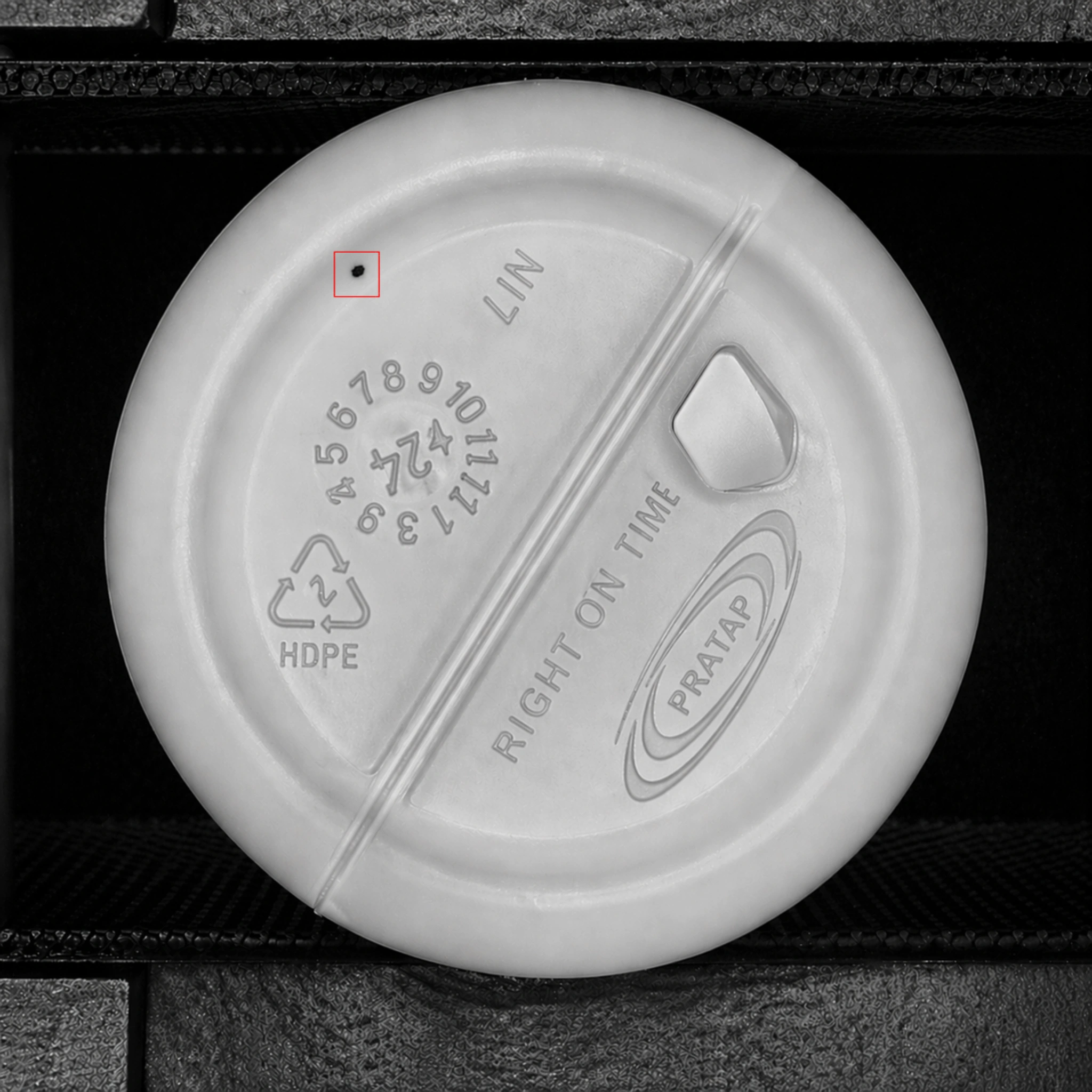 Dark spot defect inside agrochemical HDPE bottle — detected by BIS STD+ inside camera