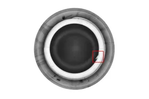 Flash defect on bottle sealing surface — extra material protruding from the sealing lip, detected by BIS-SC