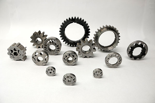 Precision machined parts typical of metrology applications — illustrative
